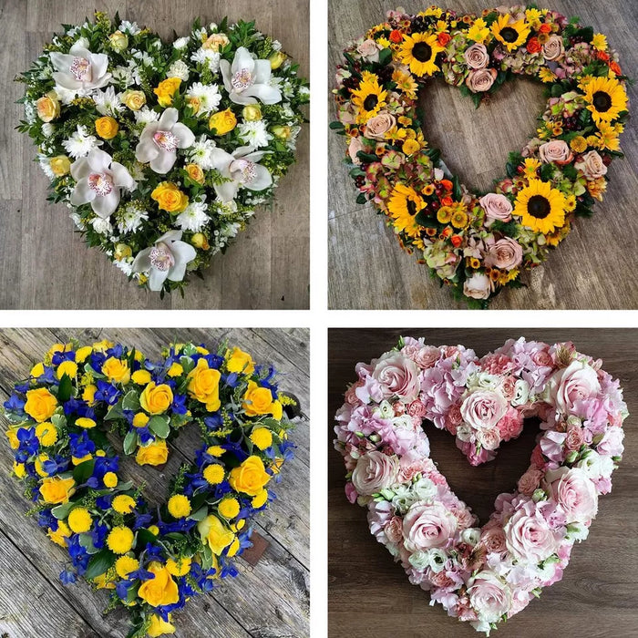 Florist's choice seasonal funeral heart tribute