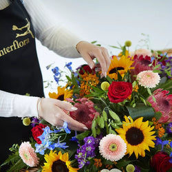 Natural Vibrance Casket Spray – Newlands Flower Boutique
