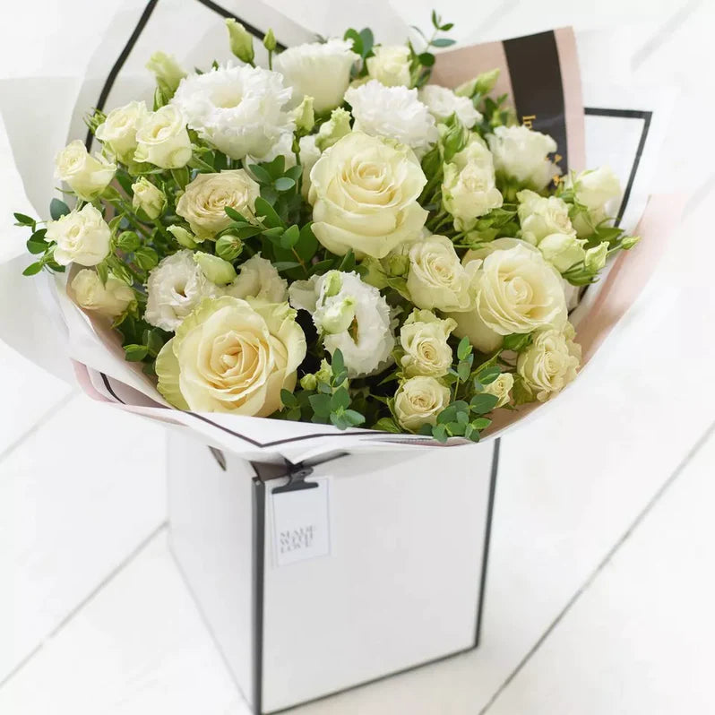
                  
                    Beautifully Simple White Flower Bouquet
                  
                