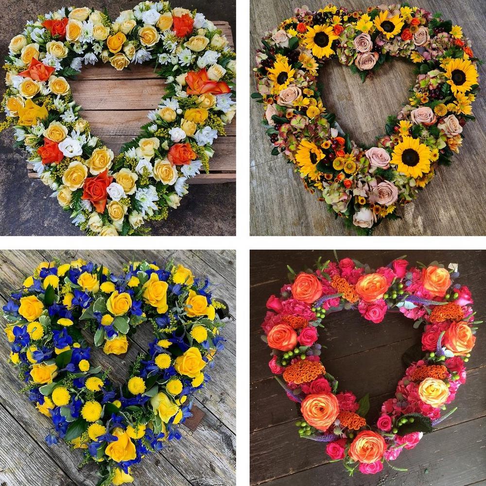 Funeral heart tribute in bright flowers — large