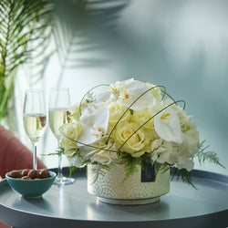 Arrangement made with the finest flowers Neutrals €125 FB23 – Newlands Flower Boutique