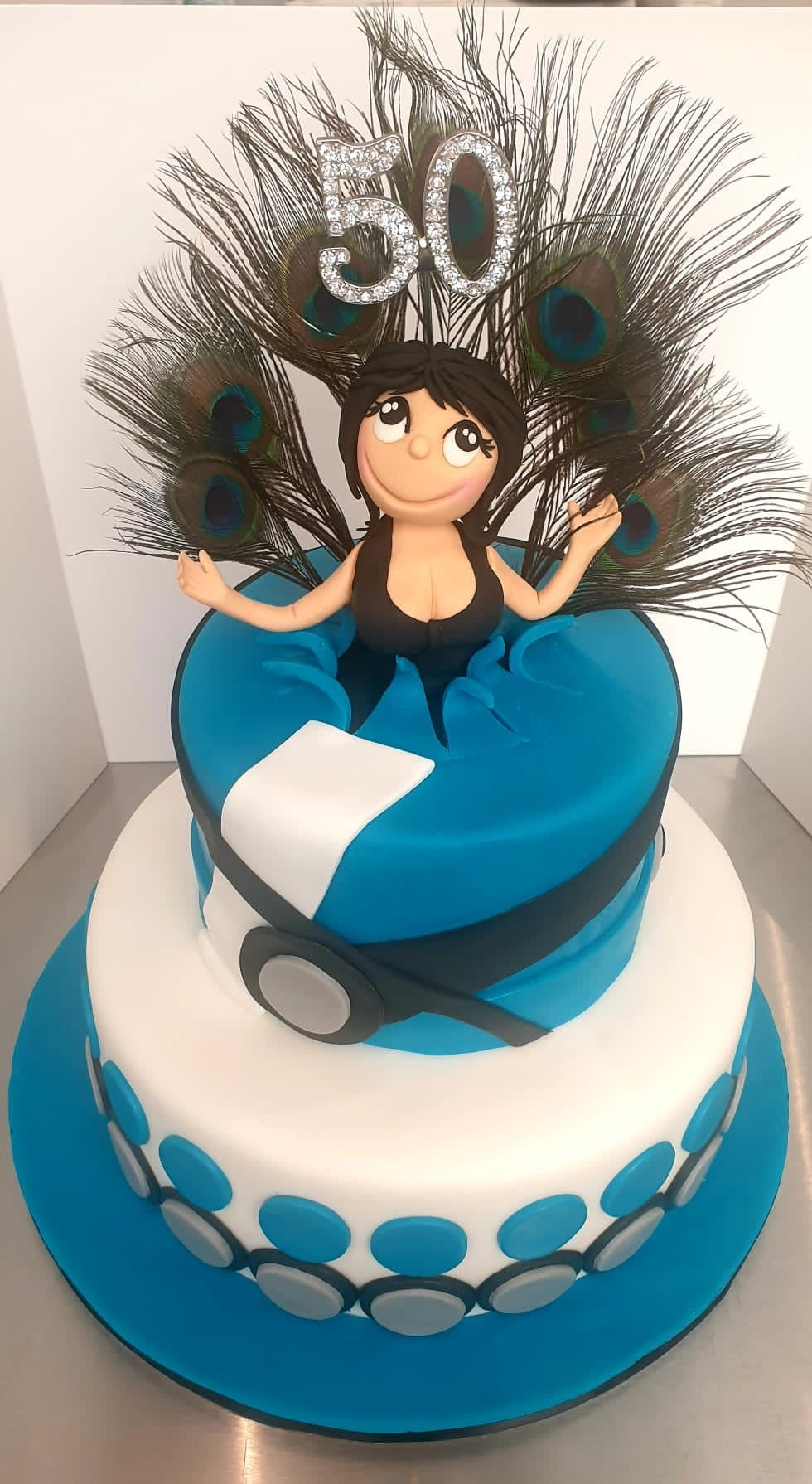 Bespoke Two Tier Girl Jumping out of Cake