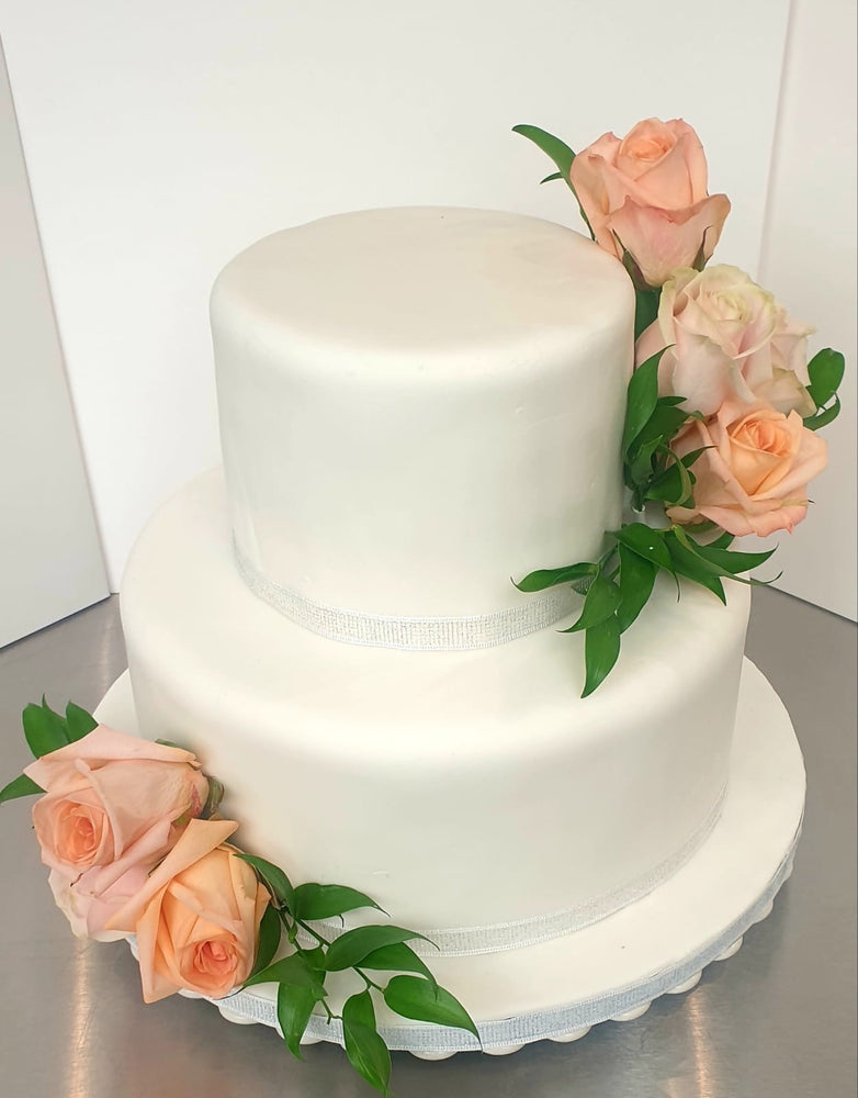
                  
                    Classic Two Tier Wedding Cake With Floral Finish 12 inch Base and 8 Inch Top
                  
                