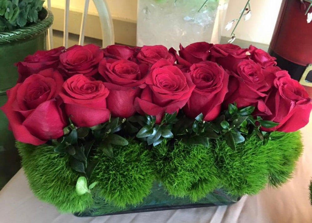 Long and Low Red Rose and green Trick Arrangement