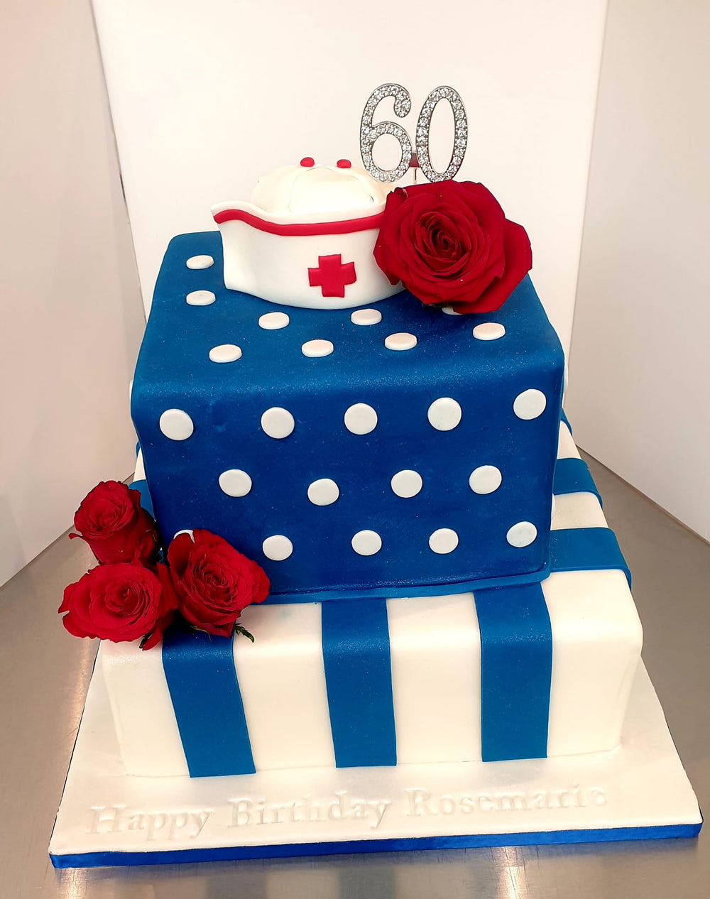Bespoke Two Tiered Birthday Cake With Nurse Theme 12 Inch