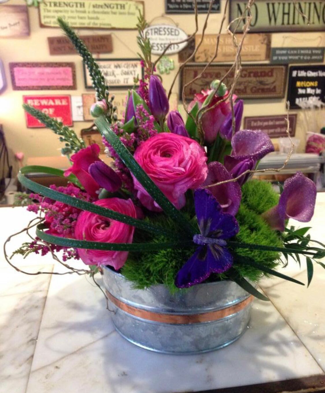 Tin Pot Arrangement Filled with a Selection of Flowers