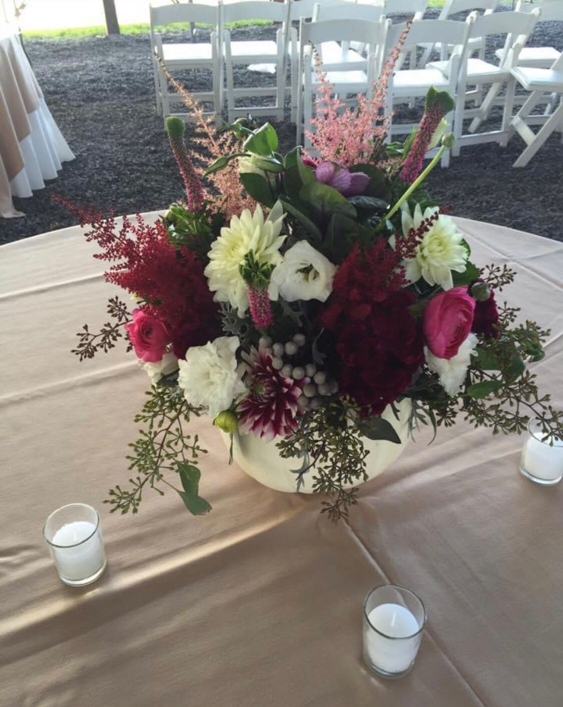 White Pumpkin Centerpiece Filled with Wild Flowers